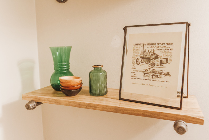 Half bathroom makeover shelving vintage industrial farmhouse decor plants modern vintage print on industrial shelf