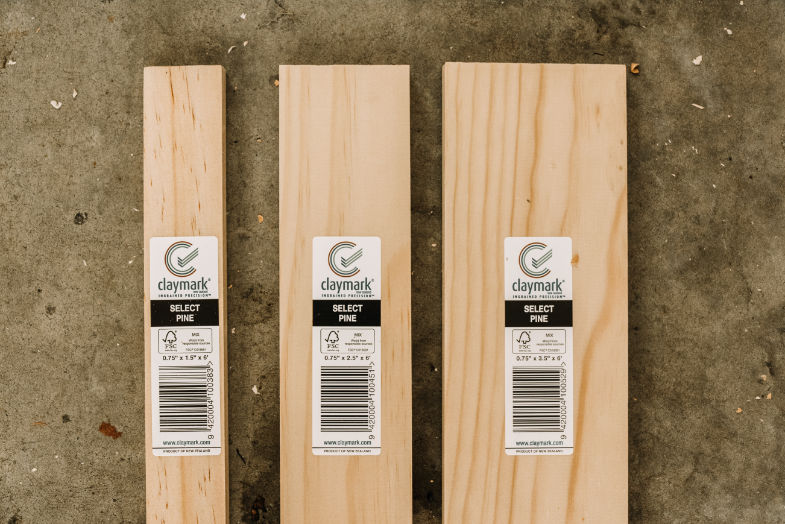 Pine boards used for DIY picture frame ledge shelf